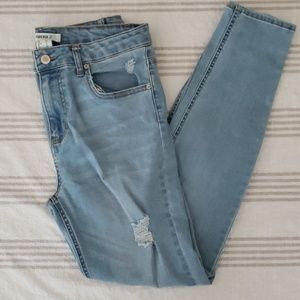 Lightly distressed denim jeans